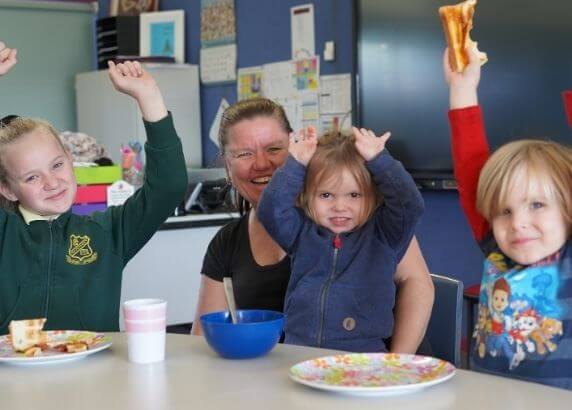 Hayley and her children enjoying Foodbanks School Breakfast program